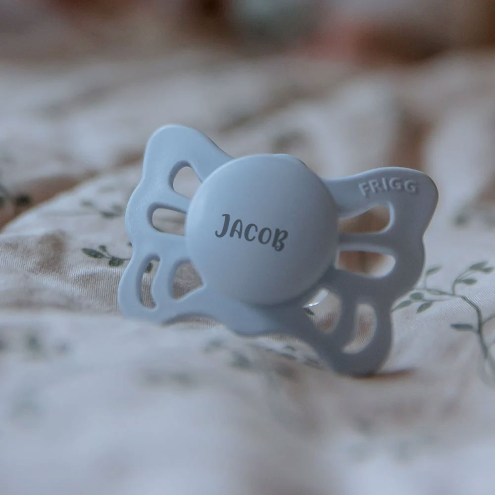 Powder Blue FRIGG Butterfly Anatomical Silicone Pacifiers | Personalised by FRIGG sold by Just Børn