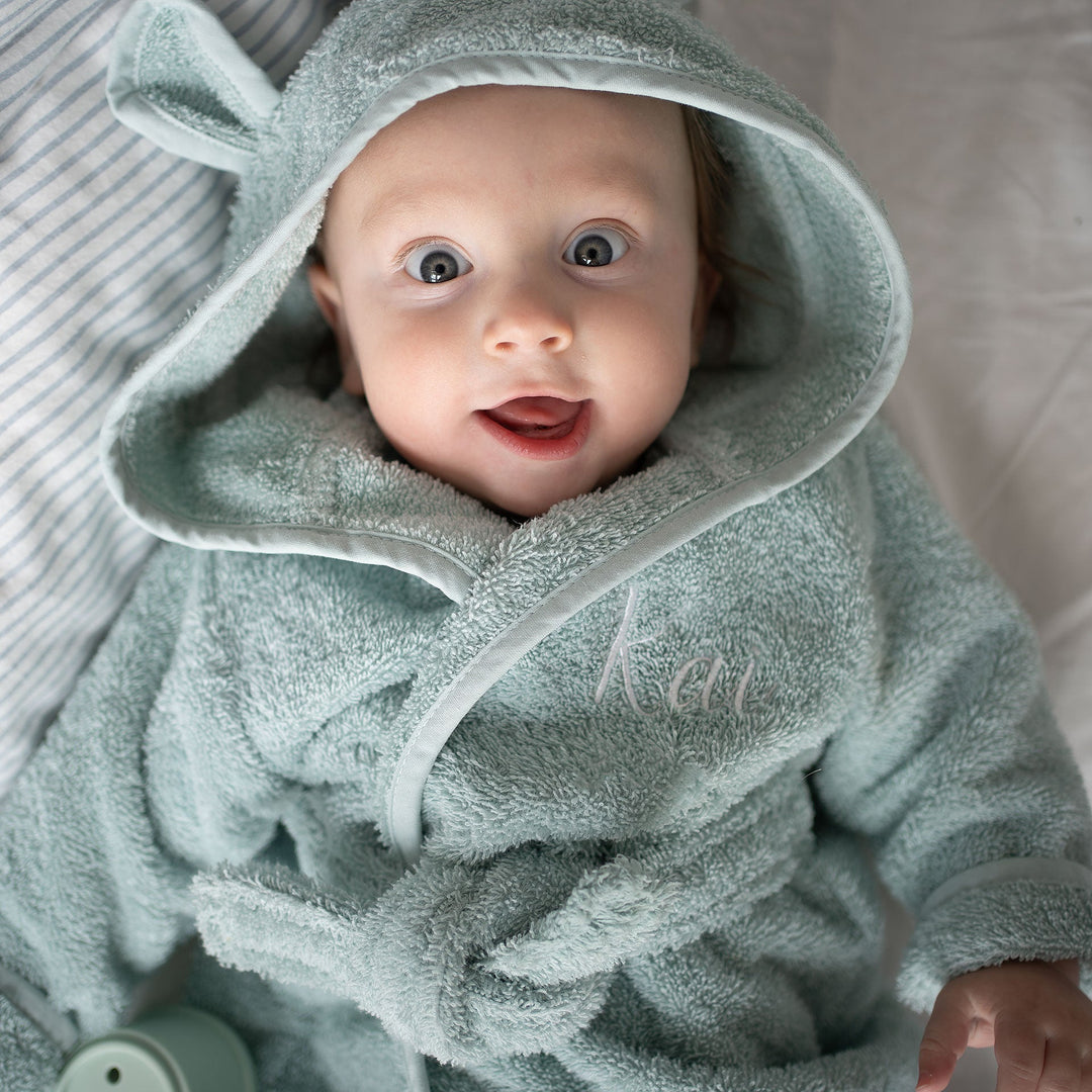 Polyester vs Organic Cotton Bathrobes: Which is Best for Your Baby's Skin?