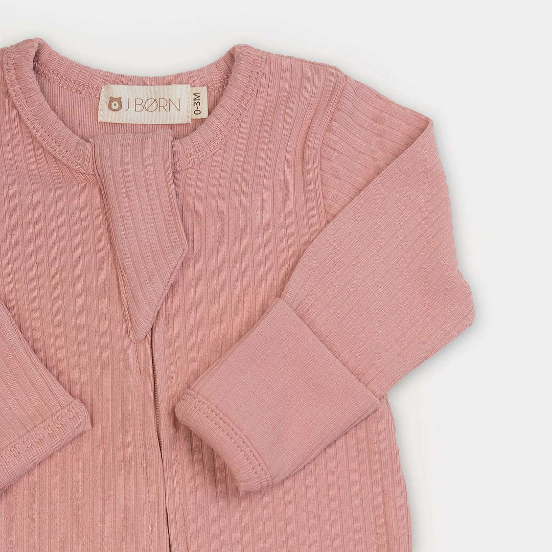 ribbed Powder Blush Ribbed Organic Cotton Sleep Suit by Just Børn sold by Just Børn