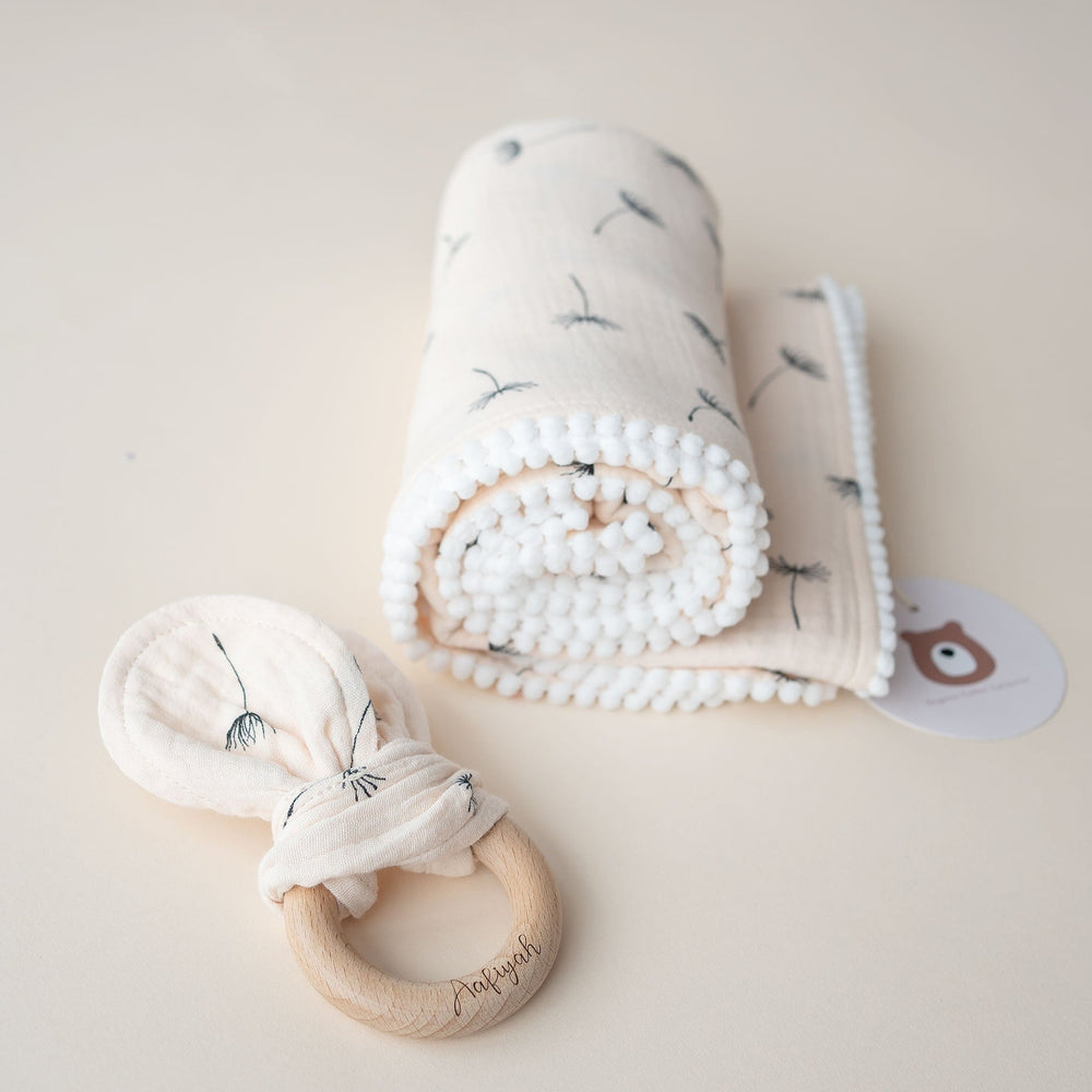 JBØRN Pop Pom Swaddle Organic Muslin Blanket & Teether Set Dandelions Muslin - Personalisable Baby Products Sold and Personalised by JustBørn