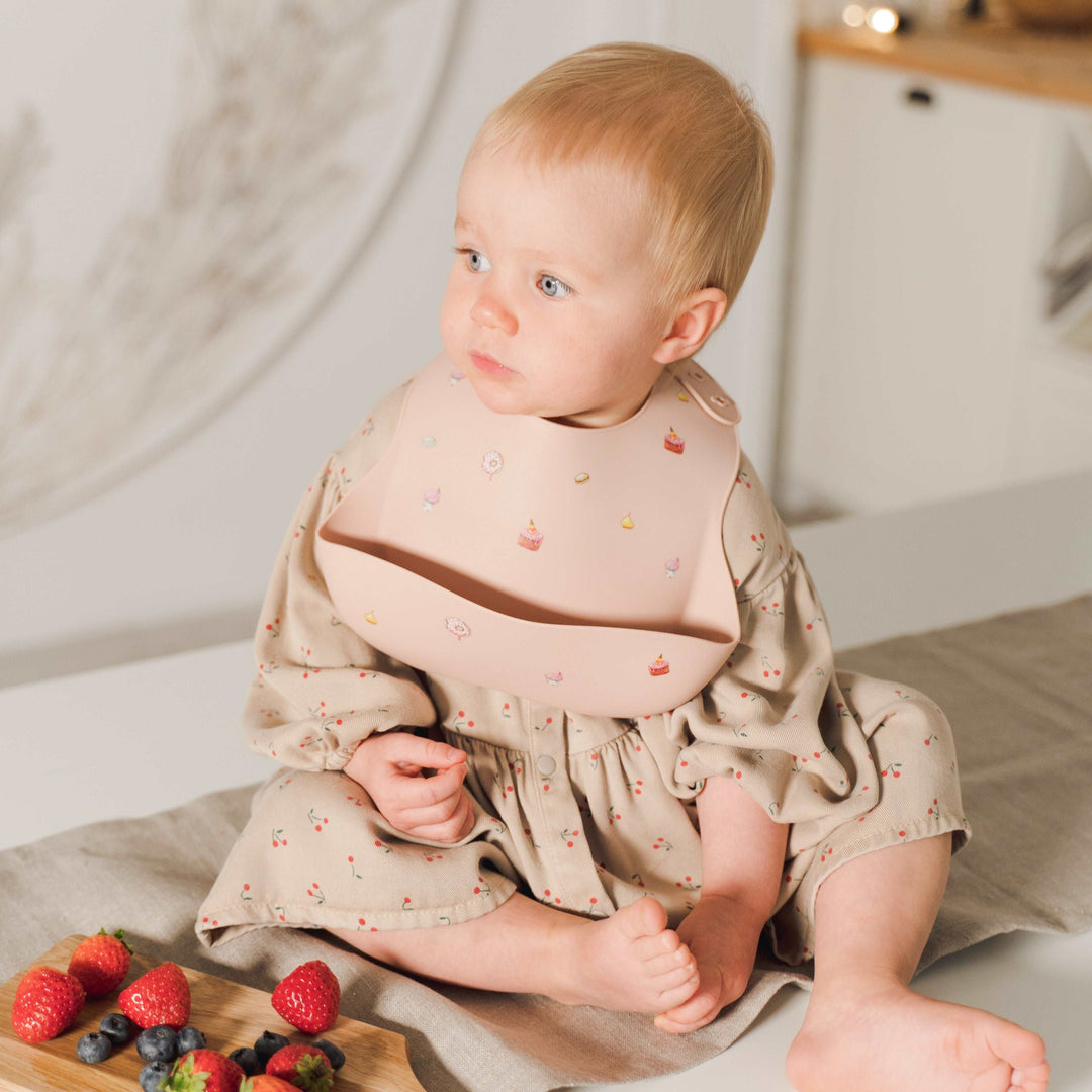 Cakes Blush JBØRN Silicone Baby Feeding Bib | Personalisable by Just Børn sold by Just Børn