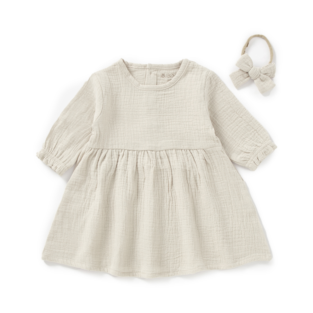JBØRN Organic Cotton Muslin Baby Girl Dress and Bow Muslin Dress | Sandstone - Personalisable Baby Products Sold and Personalised by JustBørn