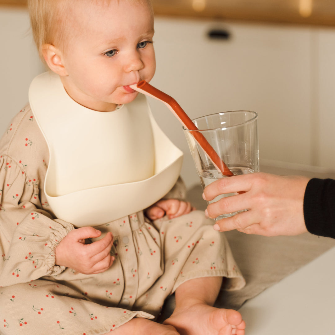 Ivory JBØRN Silicone Baby Feeding Bib | Personalisable by Just Børn sold by Just Børn