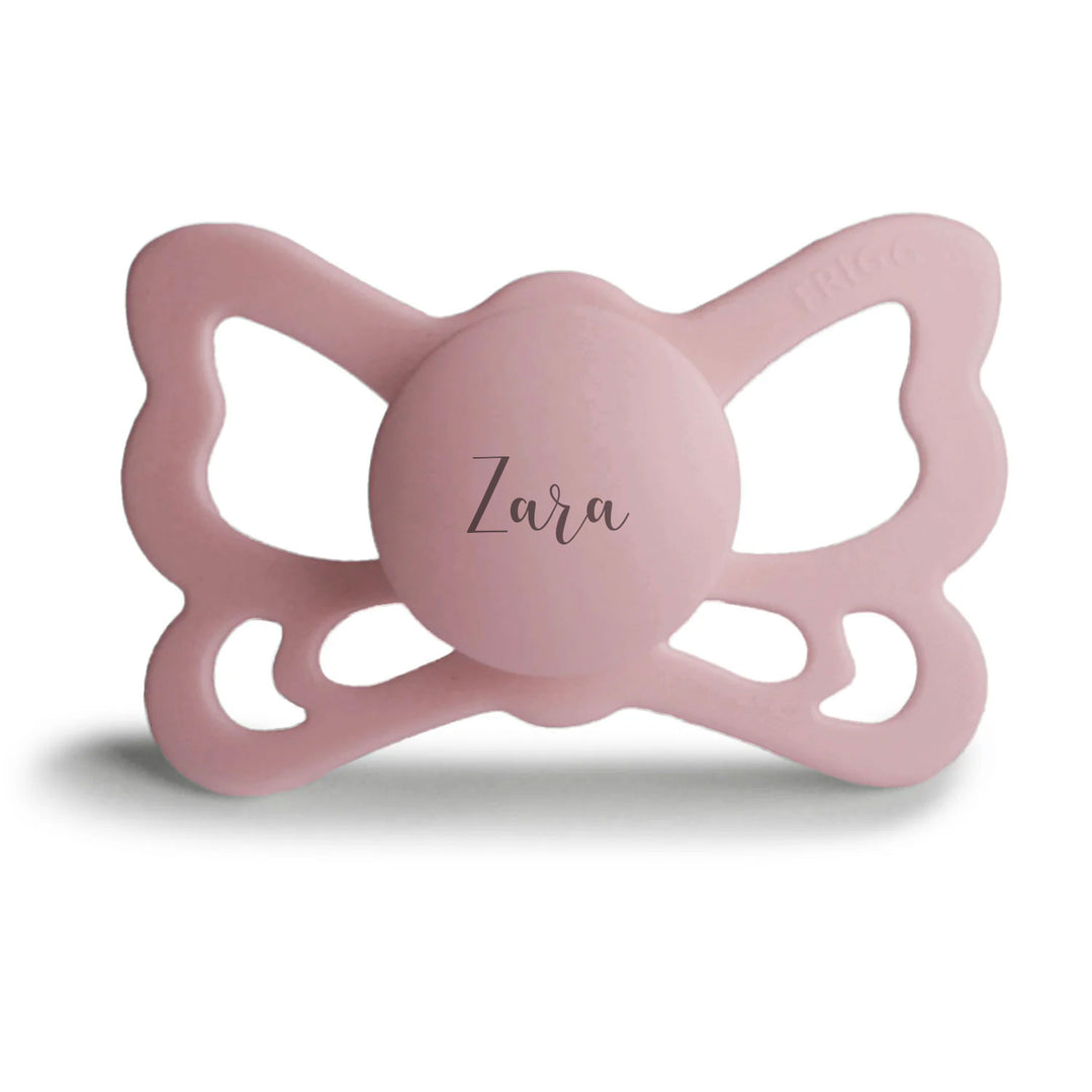 Blush FRIGG Butterfly Anatomical Silicone Pacifiers | Personalised by FRIGG sold by Just Børn